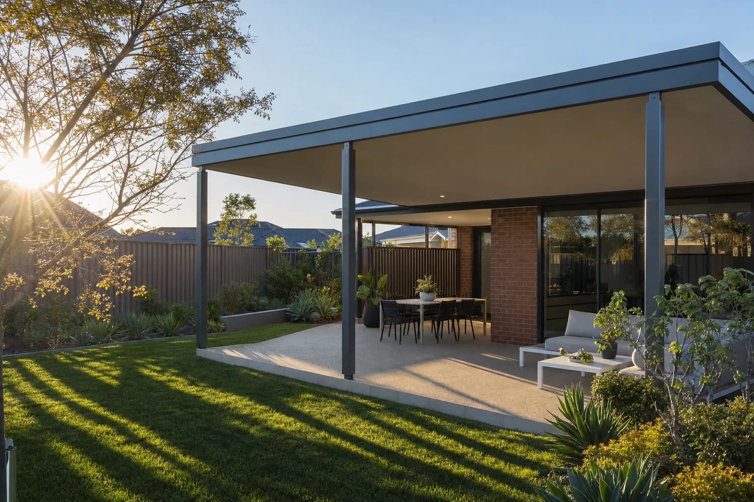 Insulated flat roof patio with a deep overhang on a brick and tile home in Greenwood