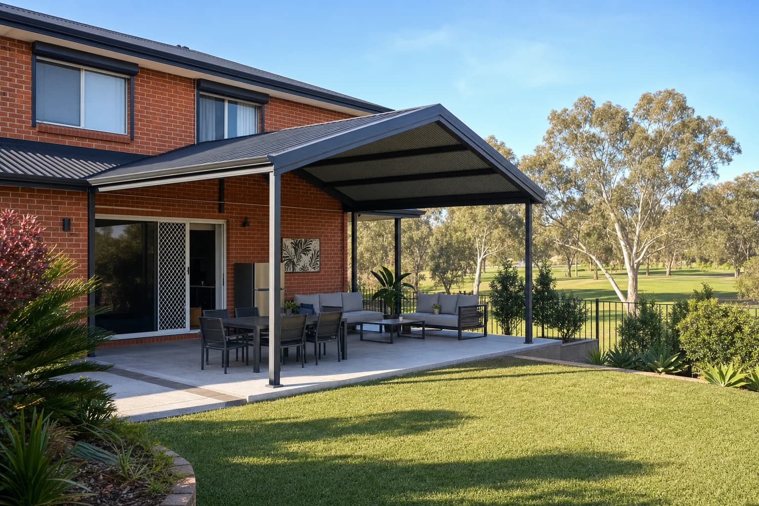 Open-sided gable patio on a 1990s brick home in Connolly