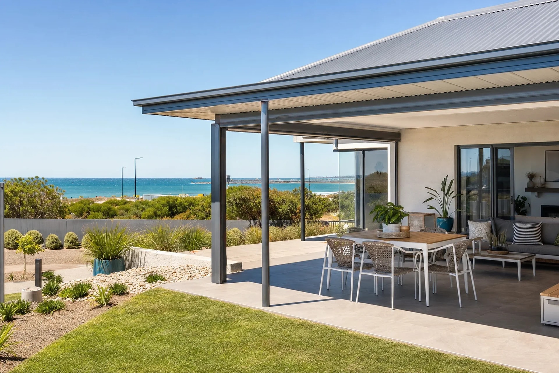 Coastal-grade Colorbond patio with powder-coated aluminium posts on a Marmion home