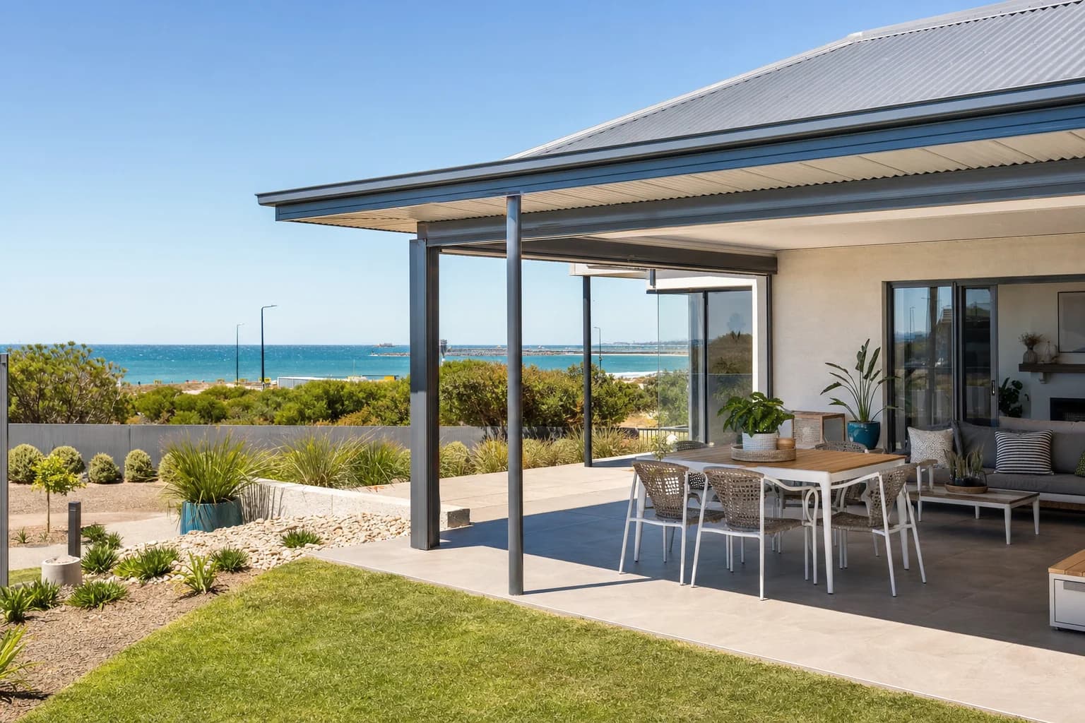 Coastal-grade Colorbond patio with powder-coated aluminium posts on a Marmion home