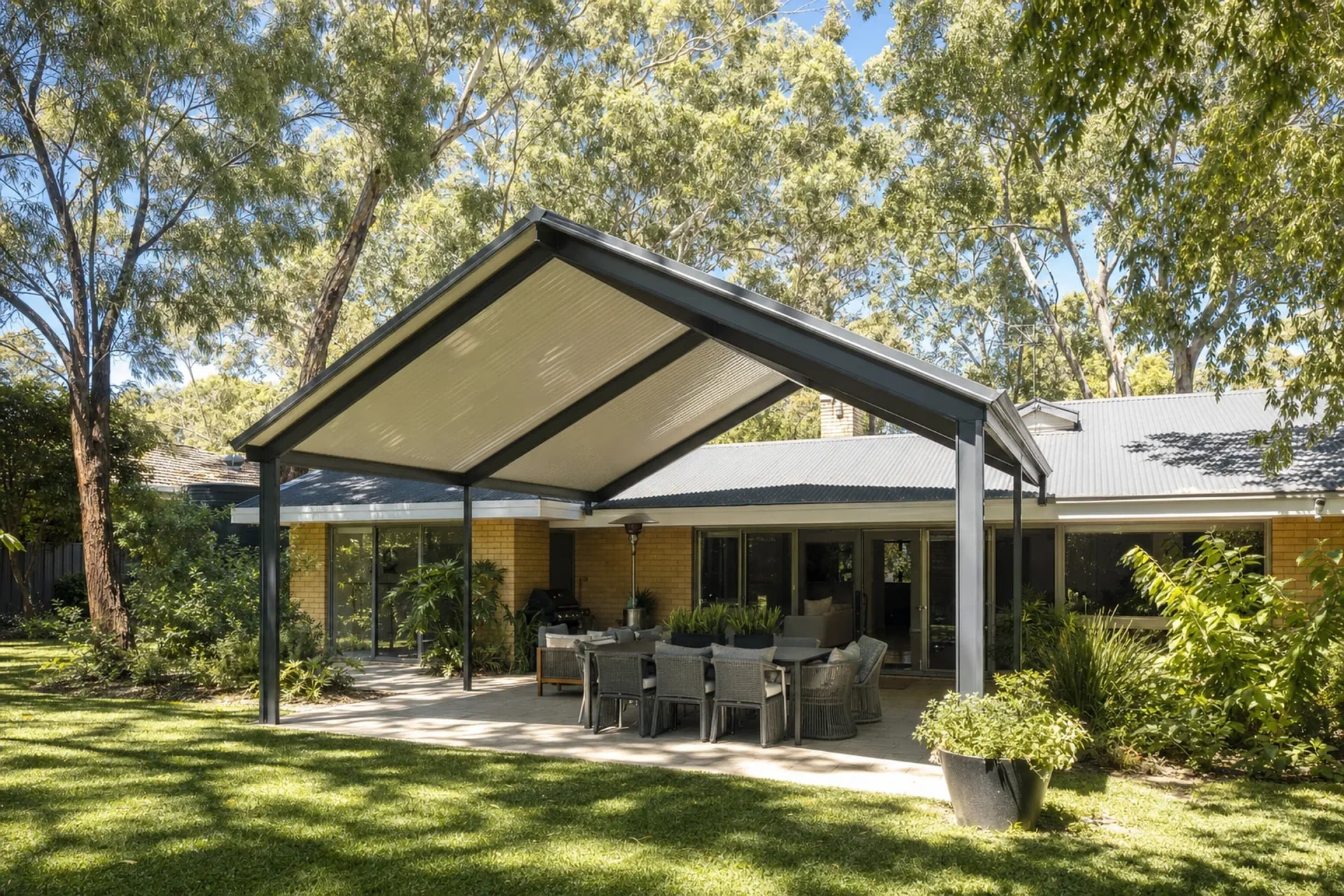 Freestanding gable patio beside mature trees in a Padbury backyard
