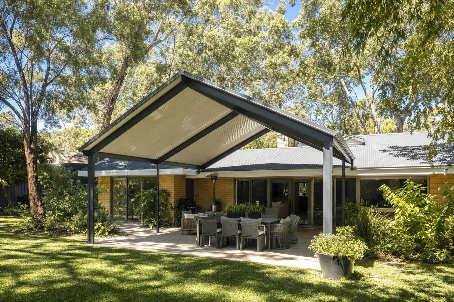 Freestanding gable patio beside mature trees in a Padbury backyard