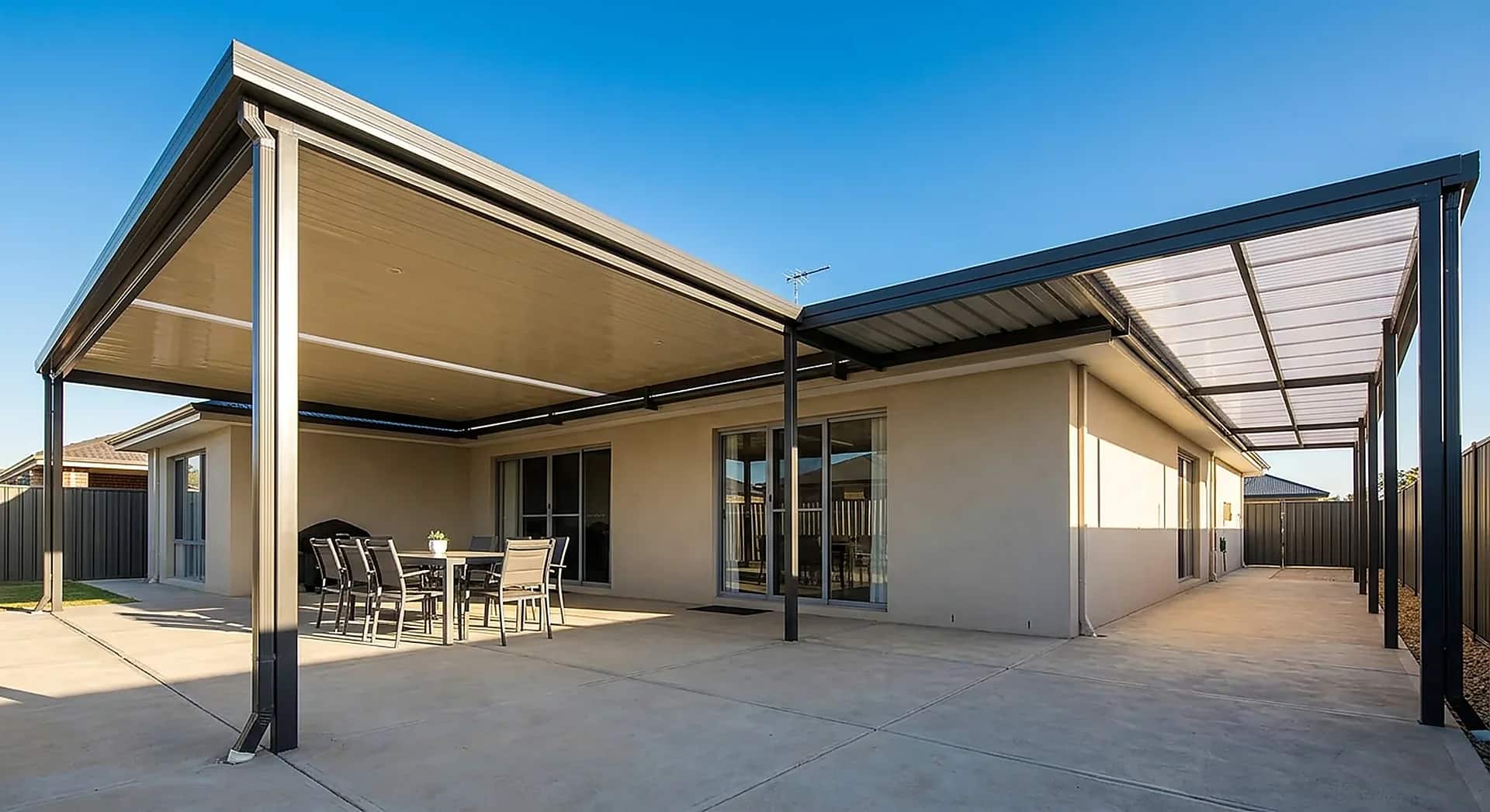 An Australian patio on a contemporary suburban home showing insulated Colorbond, single skin Colorbond and translucent roof sections